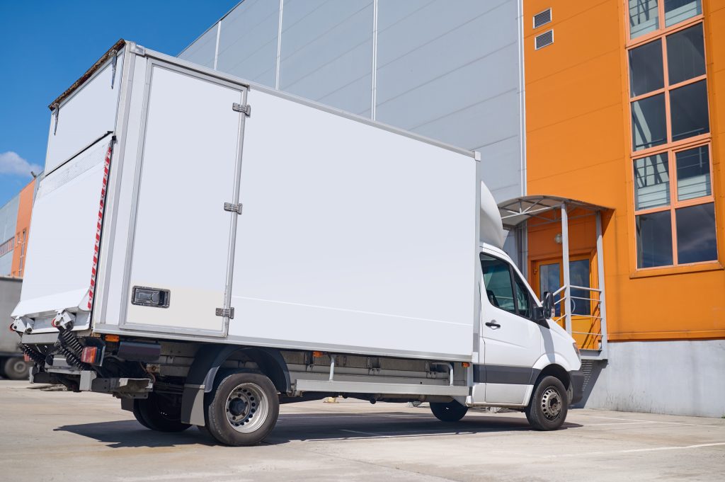 lorry standing outdoors near the warehouse 1